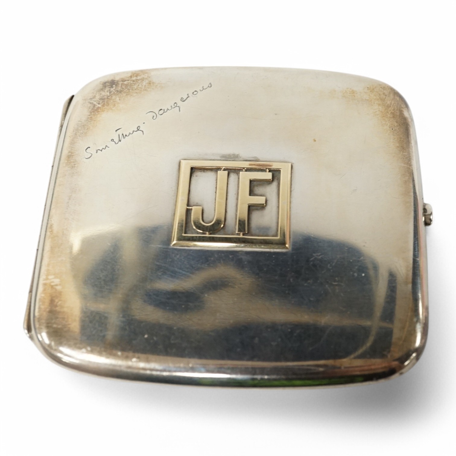 An Edwardian silver cigarette case, with engraved inscription and yellow metal monogram appliqué 'JF', by Horace Woodward & Co, Birmingham, 1908, 90mm. Condition - fair to good